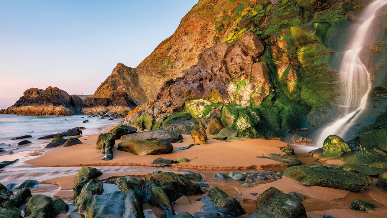 The Tresaith Waterfall in Cardigan Bay